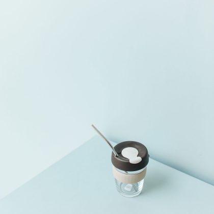 Reusable coffee cup with a lid